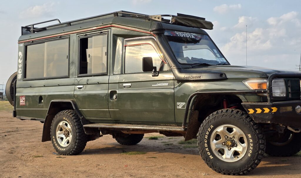 4WD Safari Land Cruiser Vehicle with open roof for Private Half Day Nairobi National Park Safari - NNP & Kambu Campers